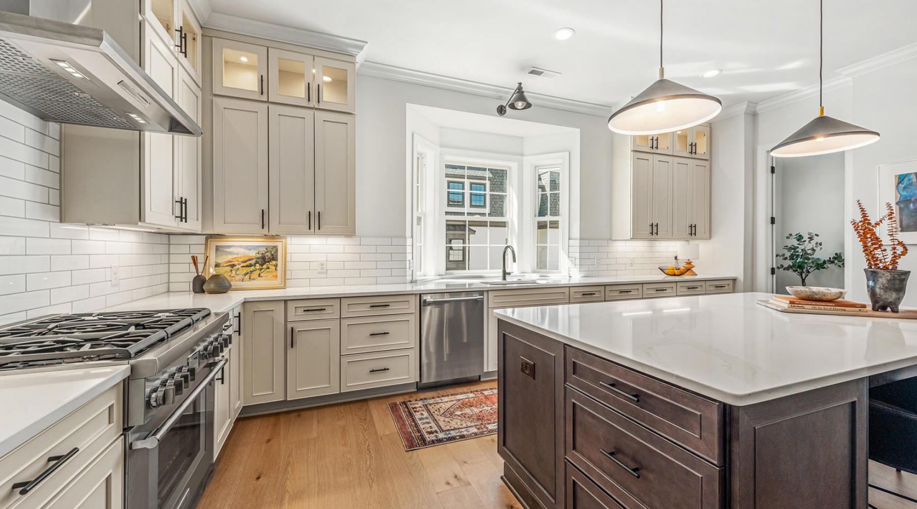 massive, open kitchen with pendant lights over large island